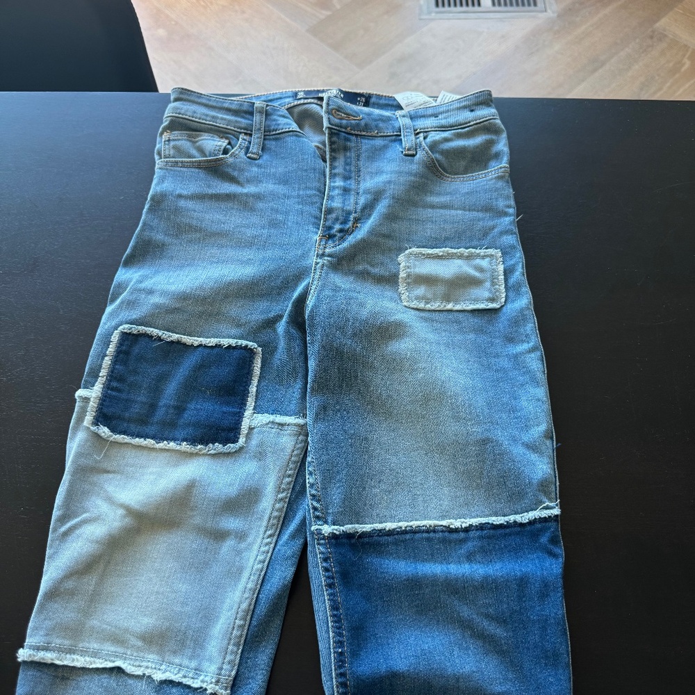 Hollister patch bellbottom jeans waist 26, length 31